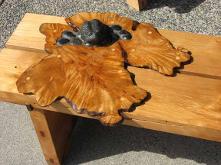 bench with burl as lily pad and frog on top
